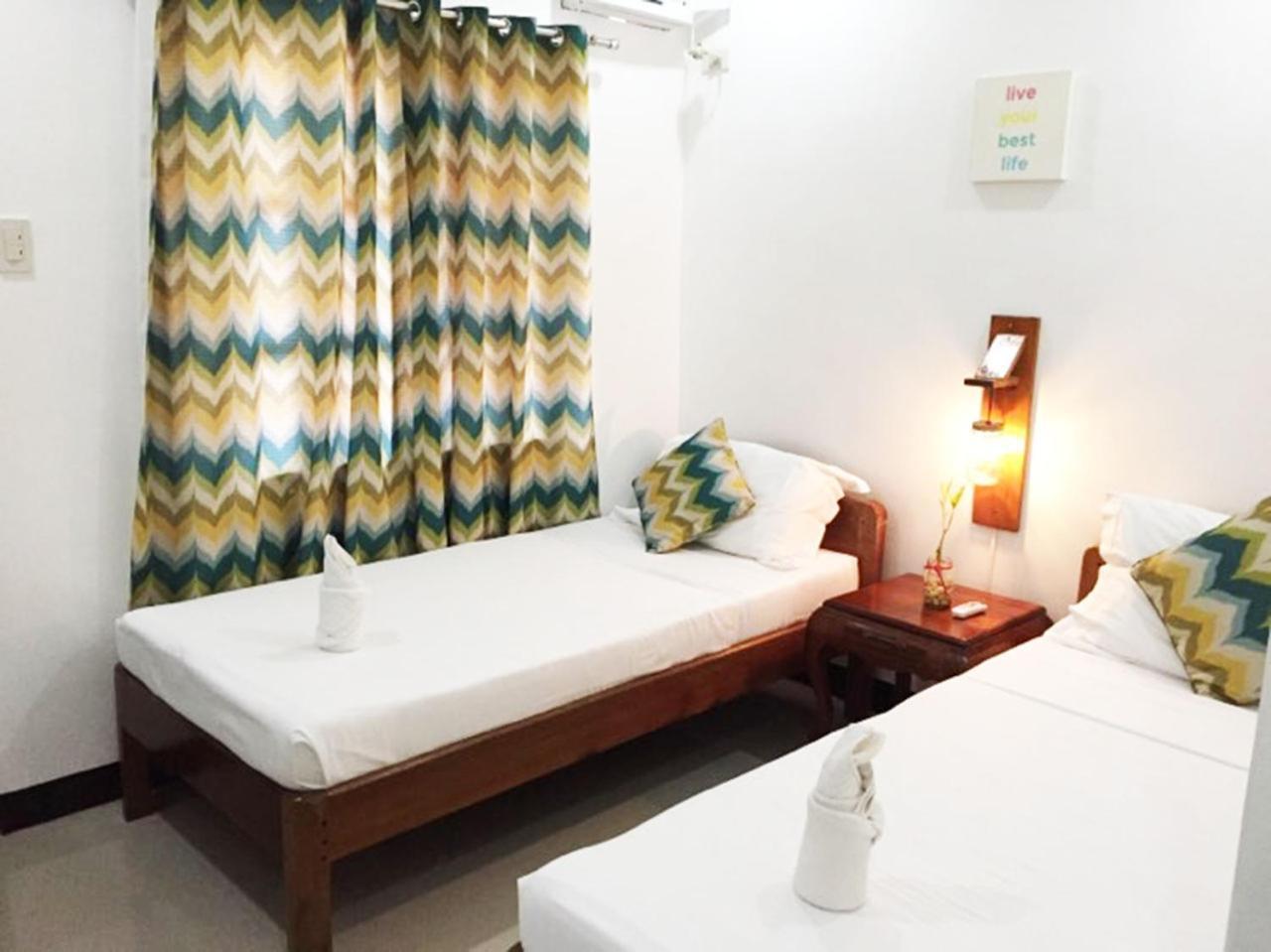 A&J Pension Puerto Princesa Exteriör bild